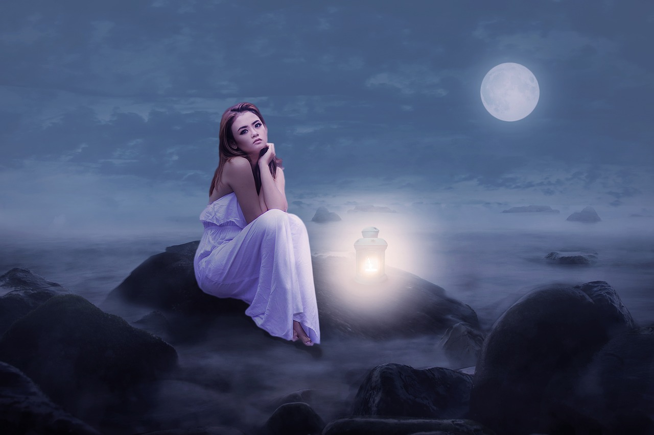 Immagine di una dolce buonanotte con frasi ispiratrici e sfondo notturno.